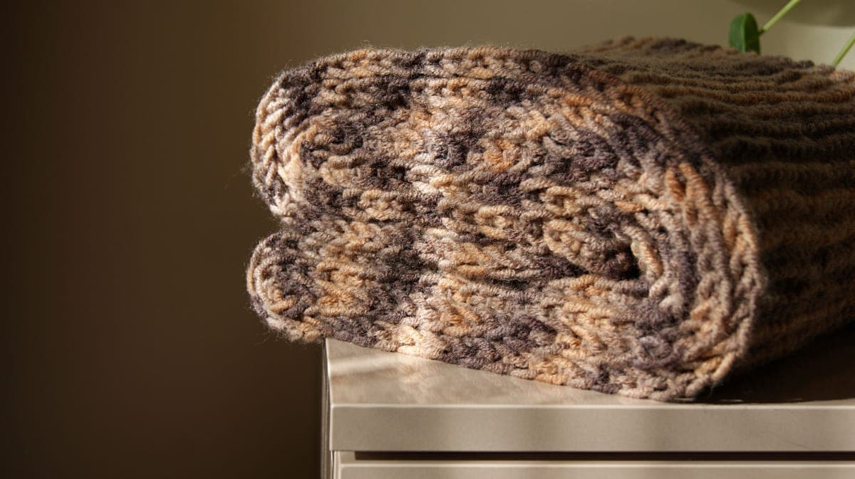 A folded plush blanket showing its texture