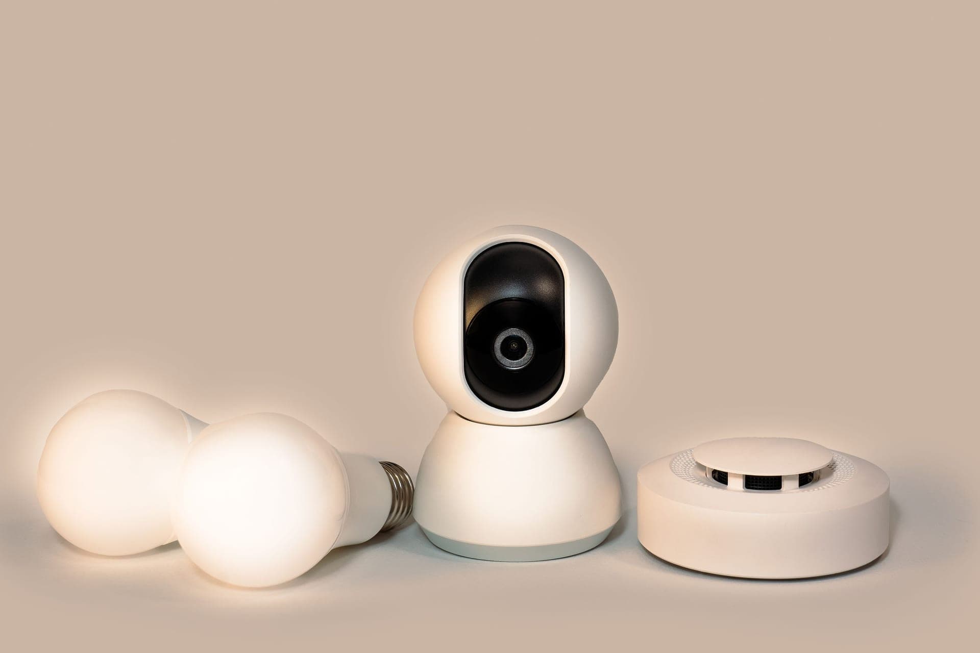 Home safety devices including a smoke alarm on a pale surface